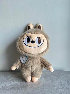 Трендовая игрушка в сером цвете